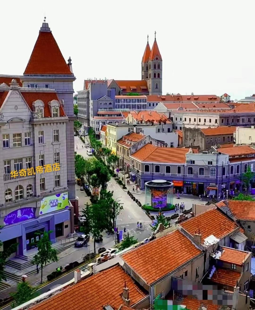 Qingdao Hua Qi Kaiserdom Hotel Bagian luar foto