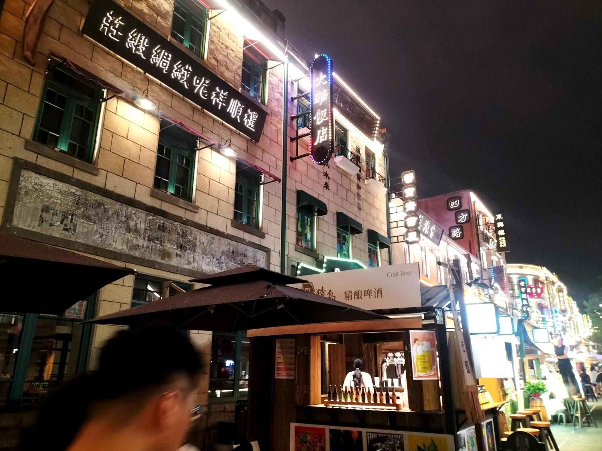 Qingdao Hua Qi Kaiserdom Hotel Bagian luar foto