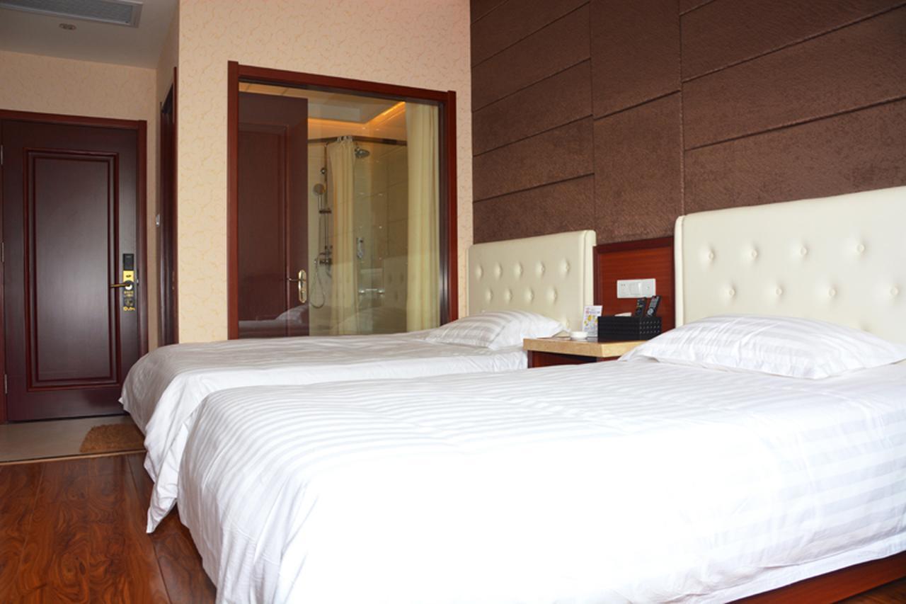 Qingdao Hua Qi Kaiserdom Hotel Bagian luar foto