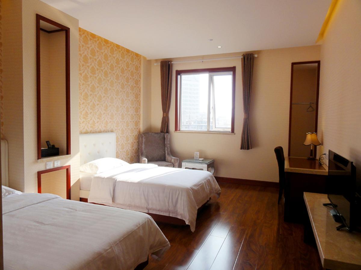 Qingdao Hua Qi Kaiserdom Hotel Bagian luar foto