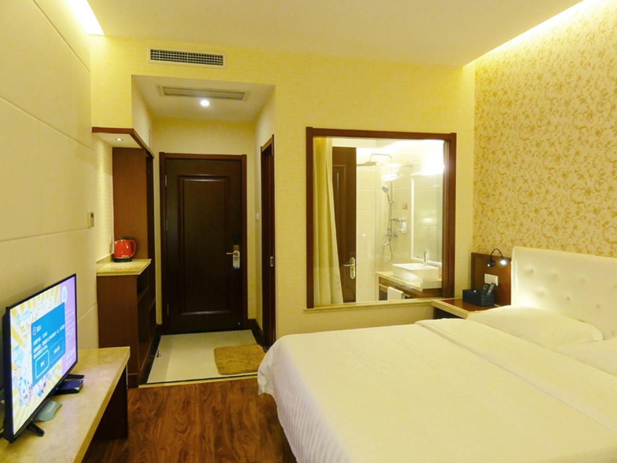 Qingdao Hua Qi Kaiserdom Hotel Bagian luar foto