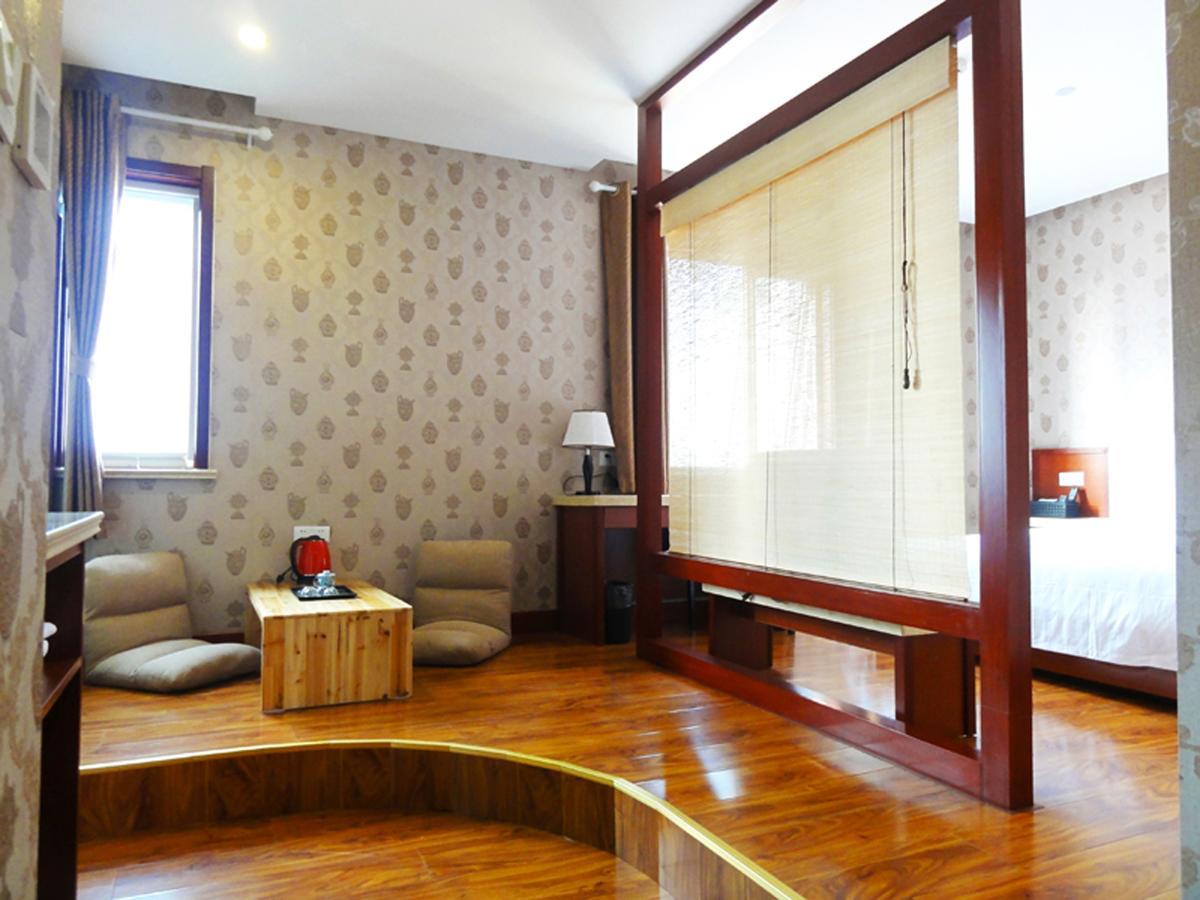 Qingdao Hua Qi Kaiserdom Hotel Bagian luar foto