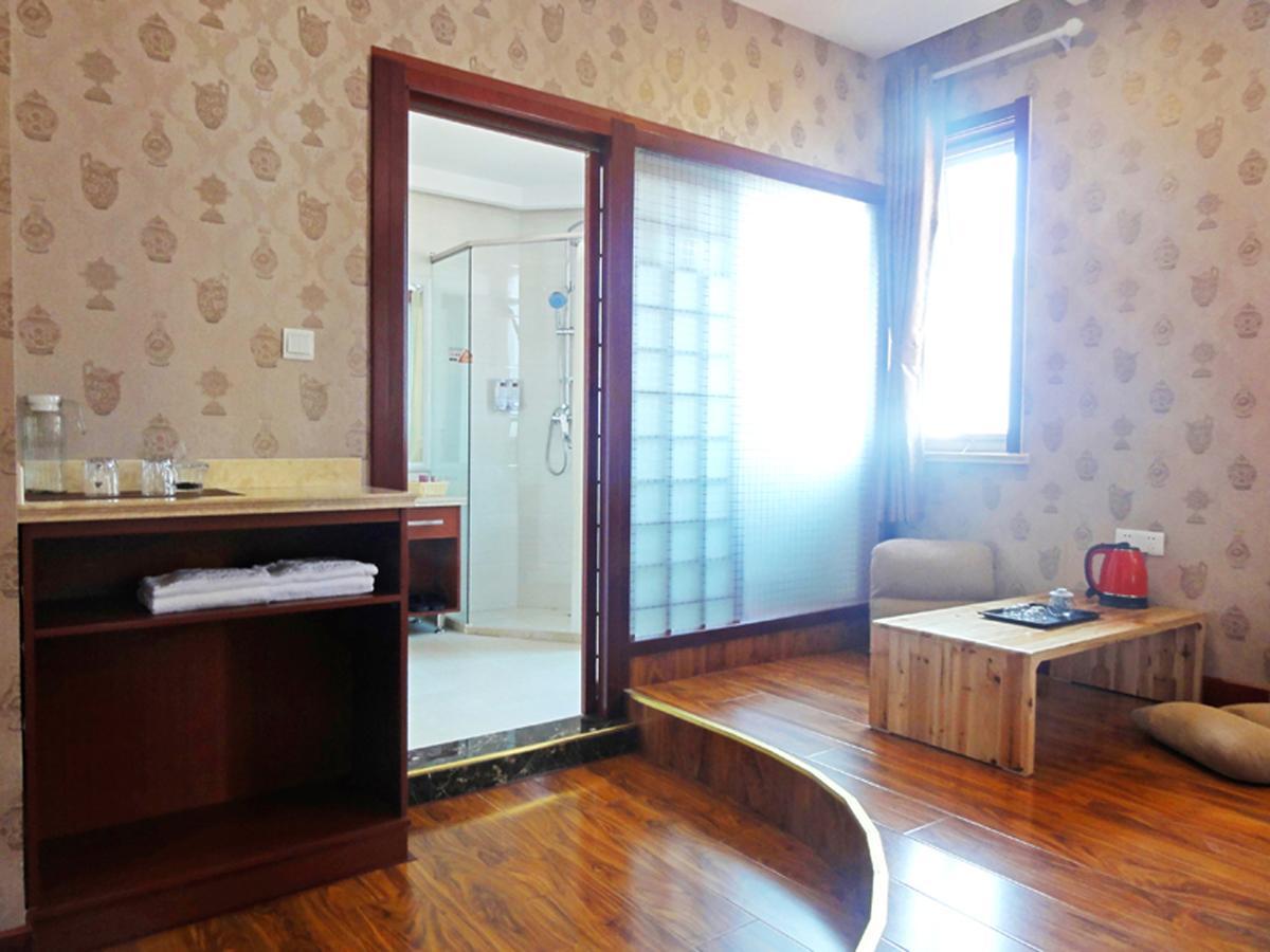 Qingdao Hua Qi Kaiserdom Hotel Bagian luar foto