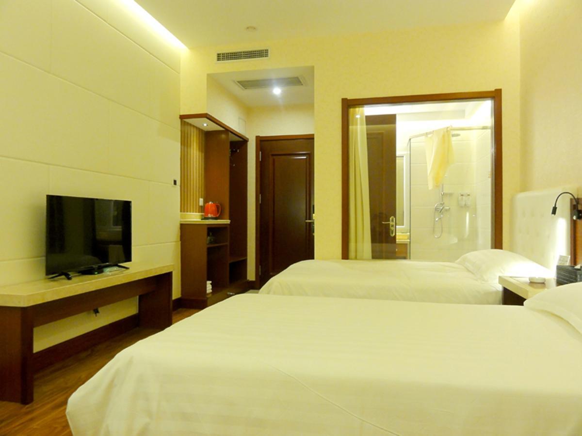 Qingdao Hua Qi Kaiserdom Hotel Bagian luar foto