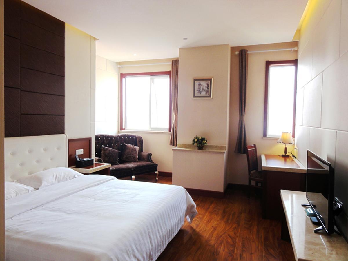 Qingdao Hua Qi Kaiserdom Hotel Bagian luar foto