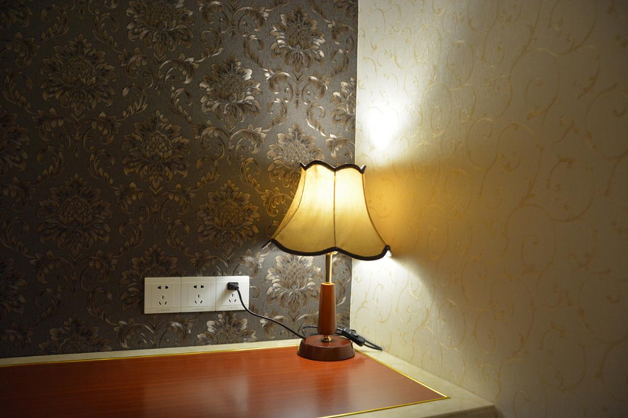Qingdao Hua Qi Kaiserdom Hotel Bagian luar foto