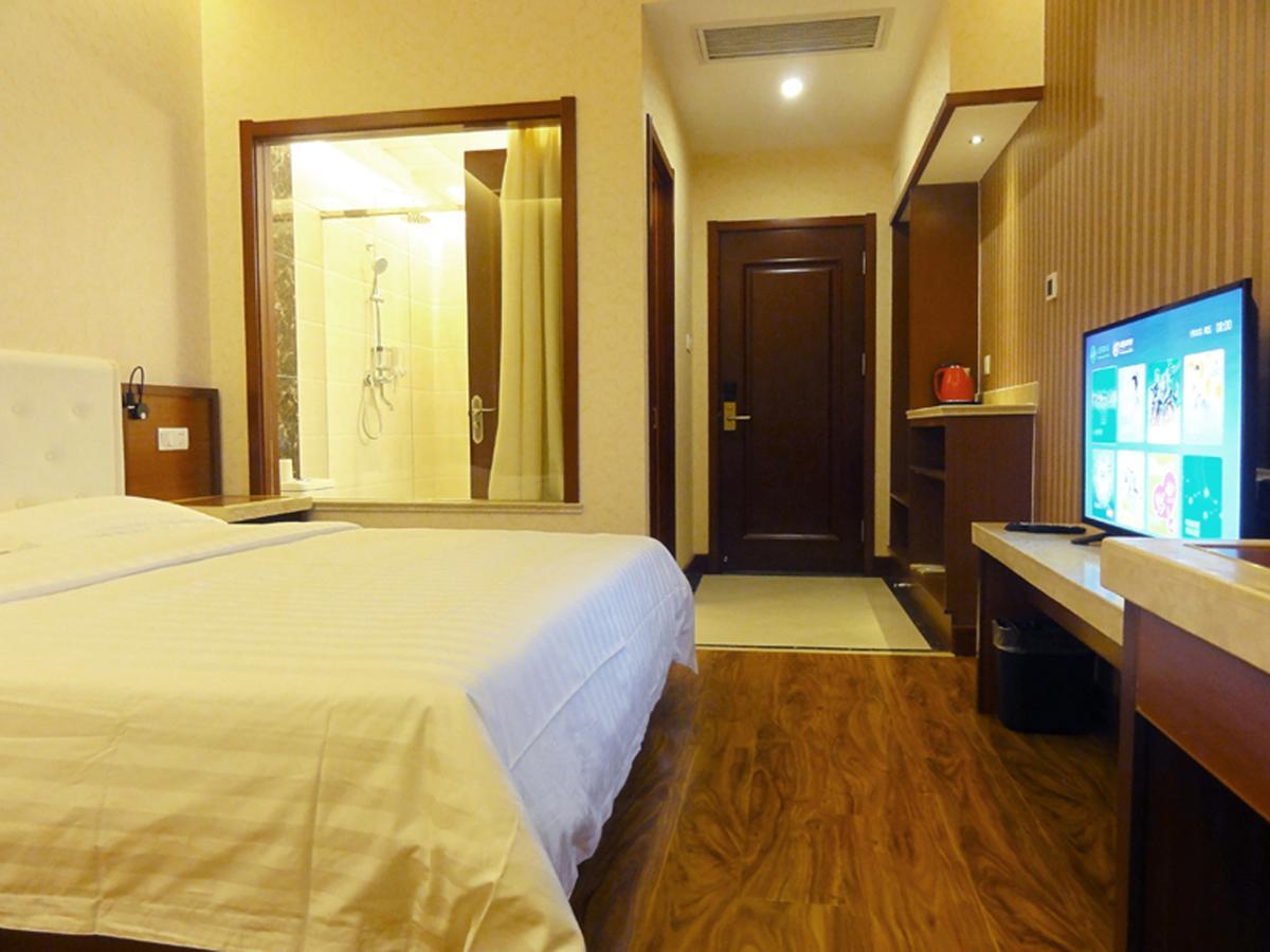 Qingdao Hua Qi Kaiserdom Hotel Bagian luar foto