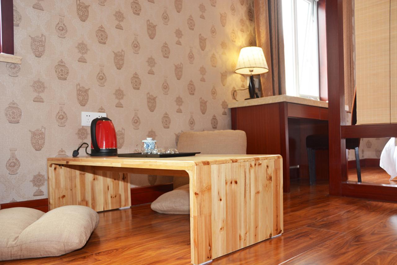 Qingdao Hua Qi Kaiserdom Hotel Bagian luar foto