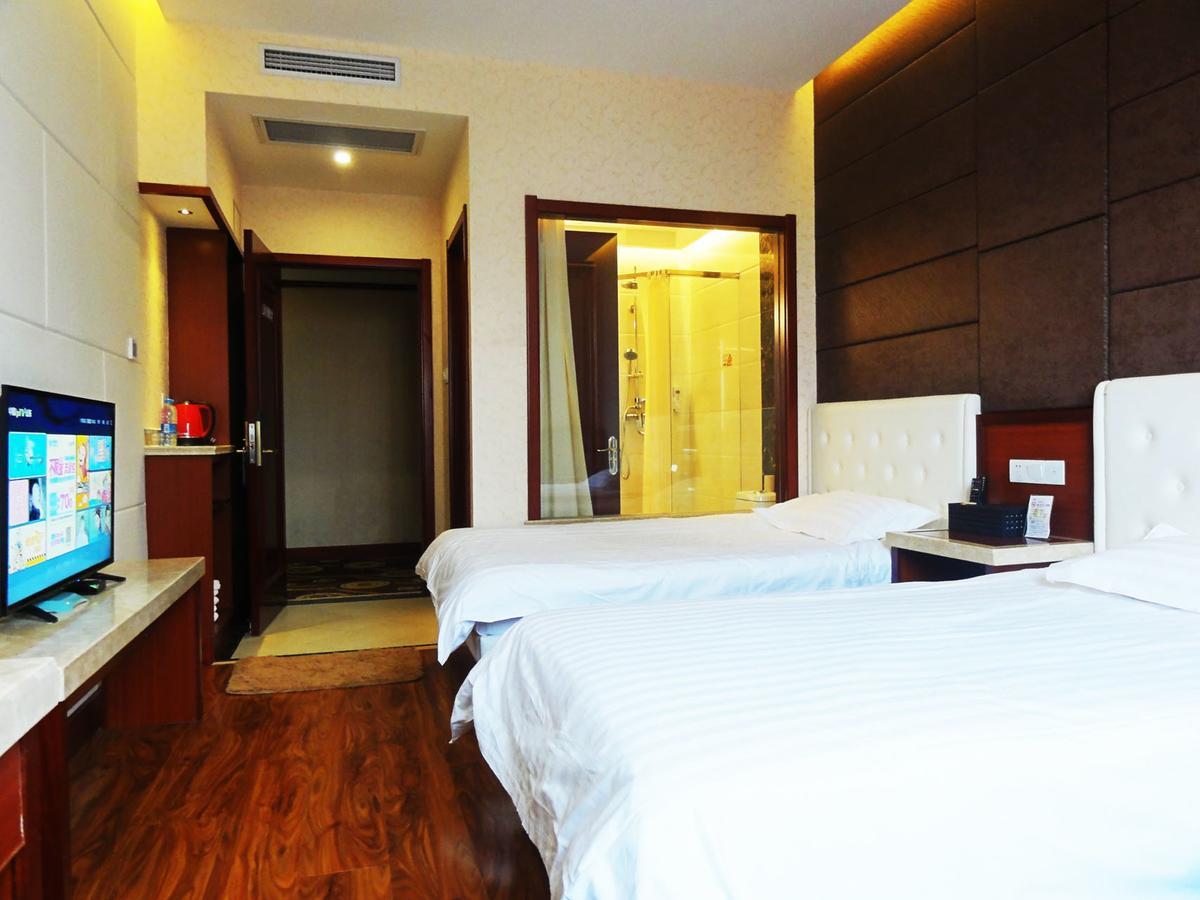 Qingdao Hua Qi Kaiserdom Hotel Bagian luar foto
